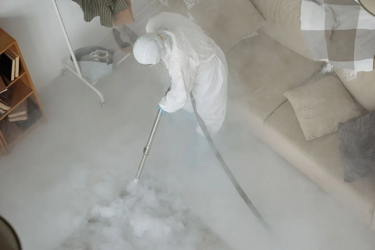 Biohazard cleanup technician in protective equipment, Williamstown, MA